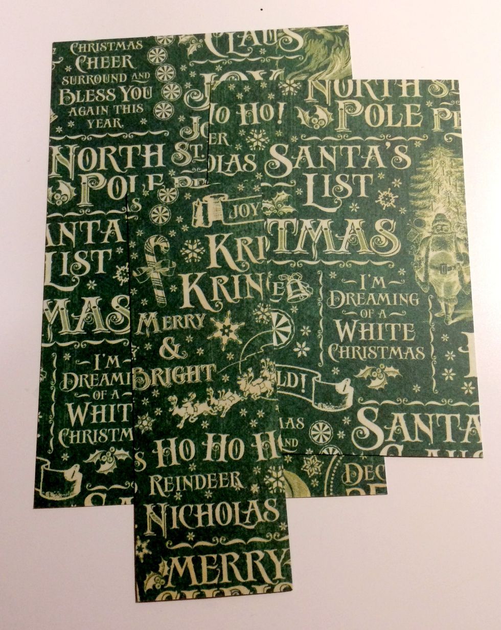 Cut three pieces from the Santa's Workshop paper that measure: 4" x 6", 3 1/4" x 4 1/4" & 1 3/4" x 4 3/4".