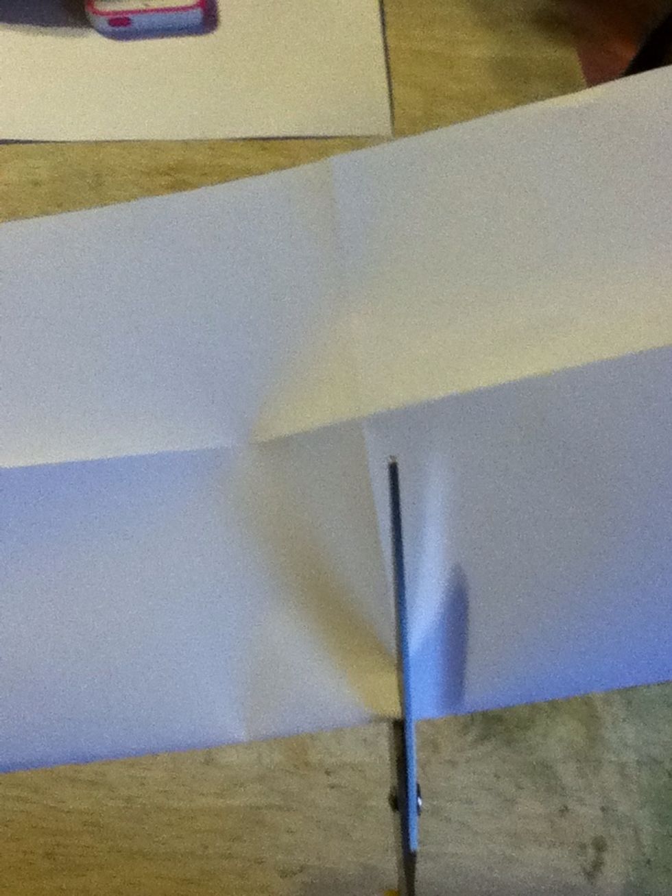 Cut through middle line to the middle.