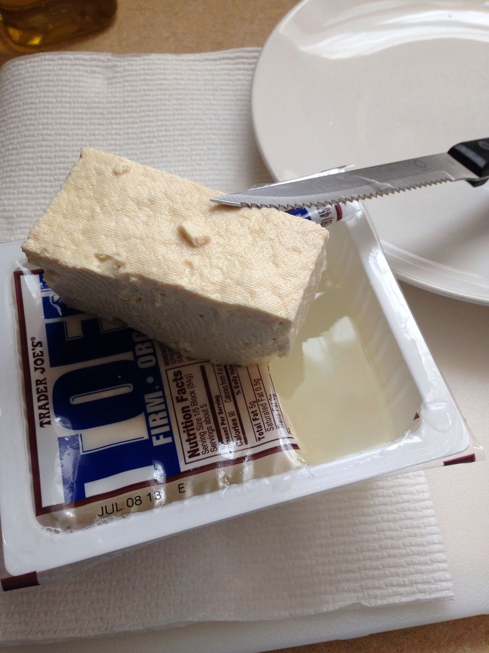 Cut tofu in half