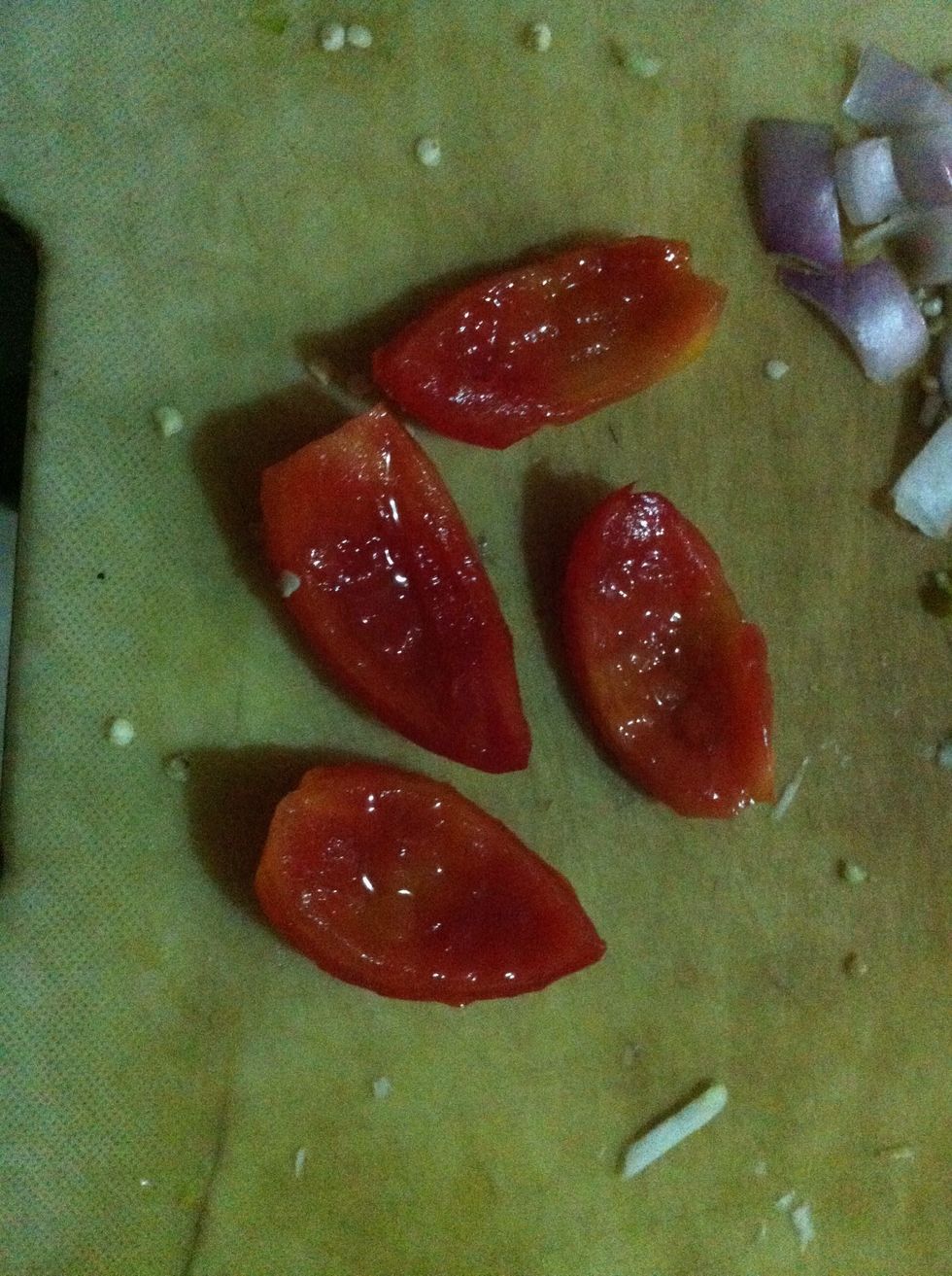 cut tomatoes and remove seeds