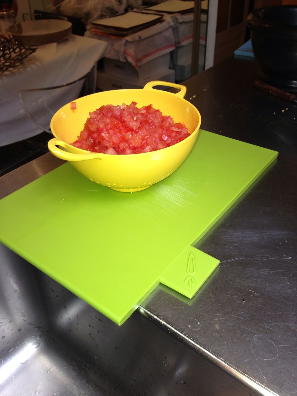 Cut tomatoes small diced. Leave them in the strainer to get rid of the extra juice. Especially if i dont use bulgar whose main function is to absorb the excess liquids.