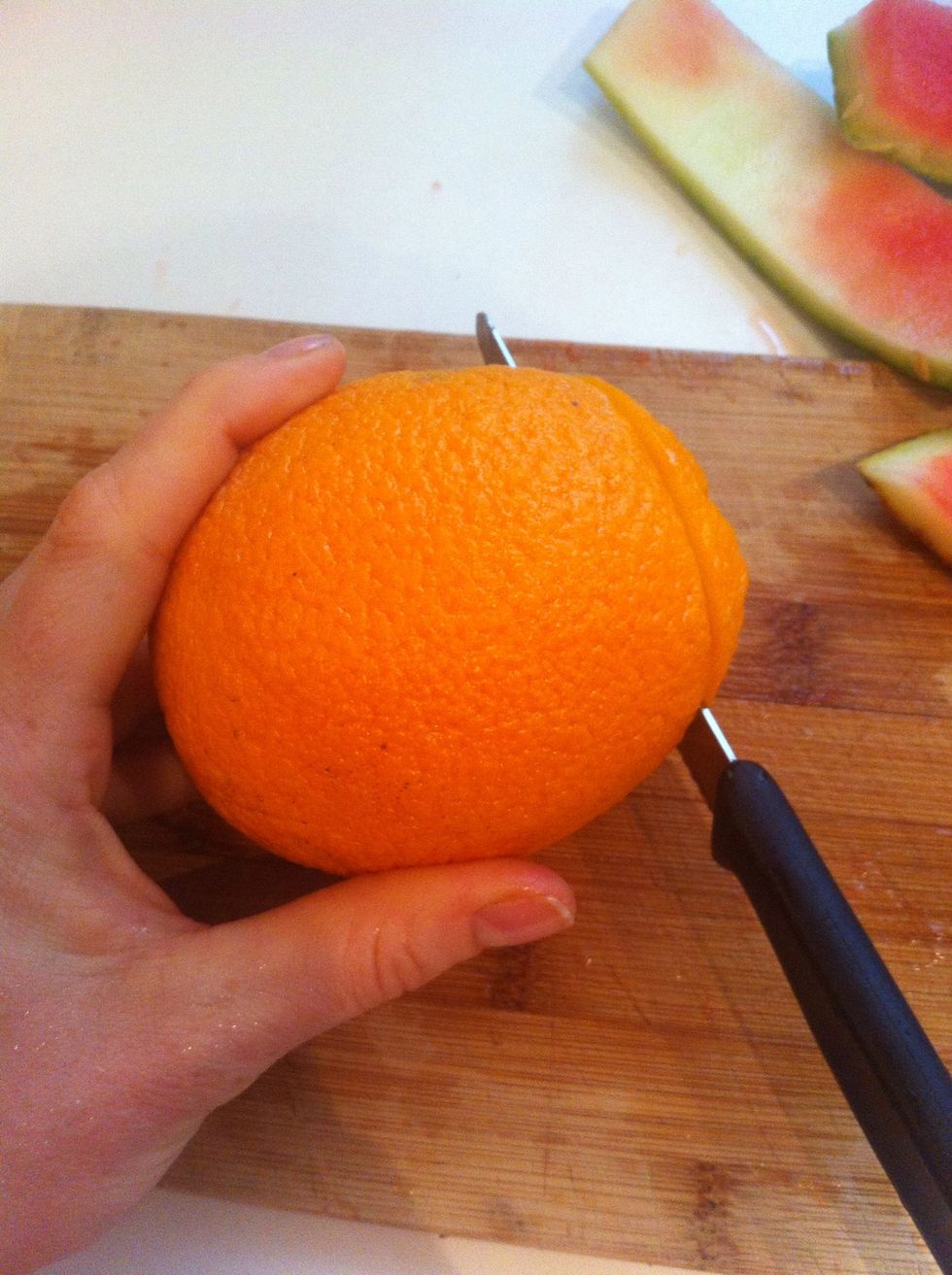 Cut top off orange