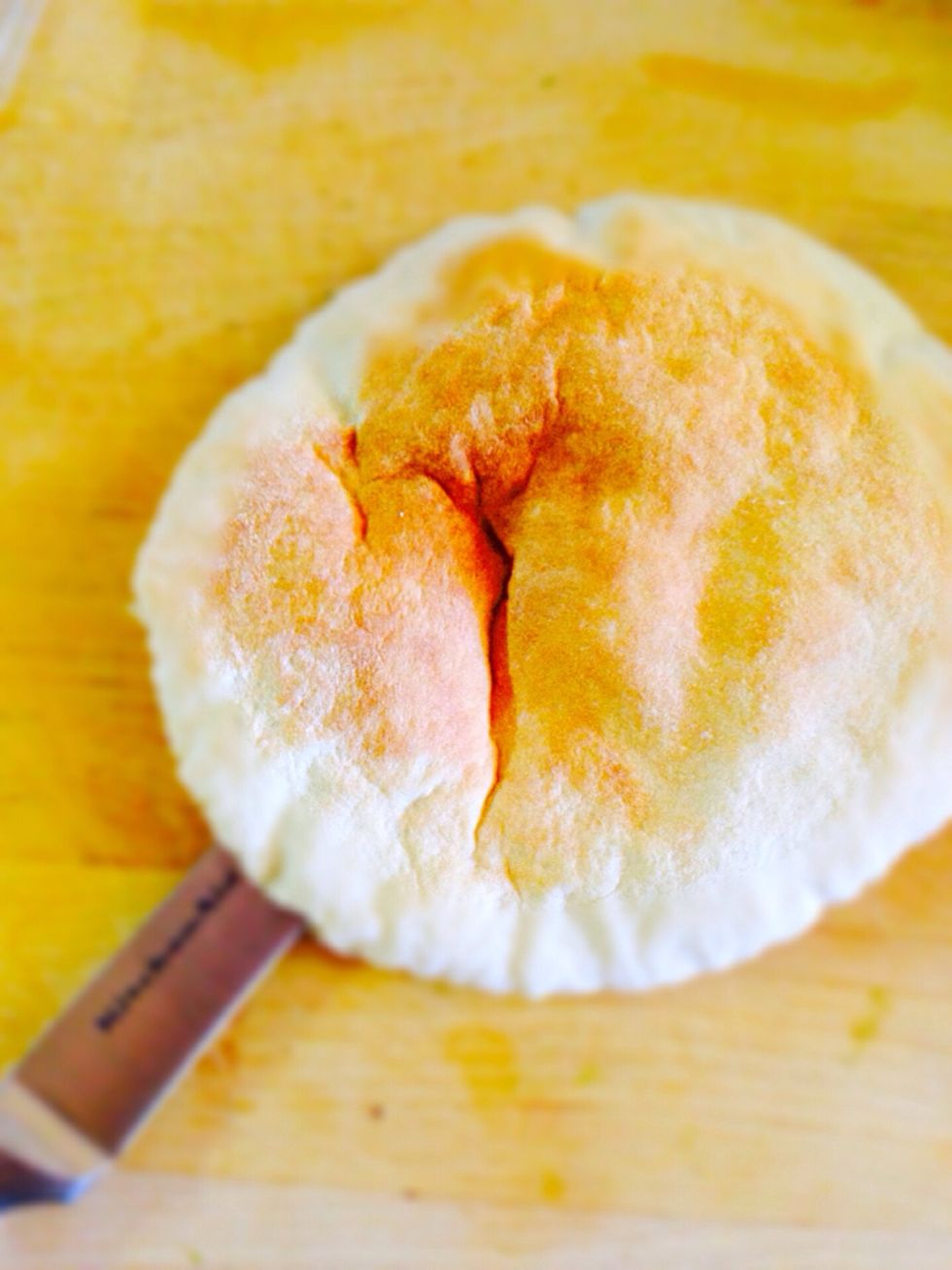 Cut triangle from pita or tortilla push through it the same wooden skewer we used to make a mouth
