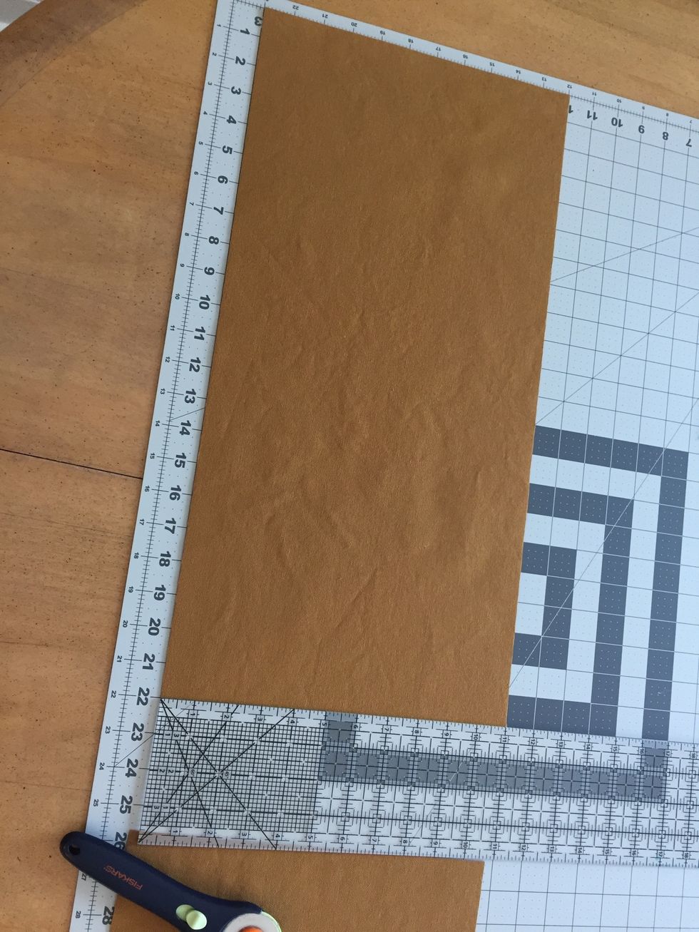 Cut two 11x22" rectangles from the contrasting fabric. Each of these will become one side.