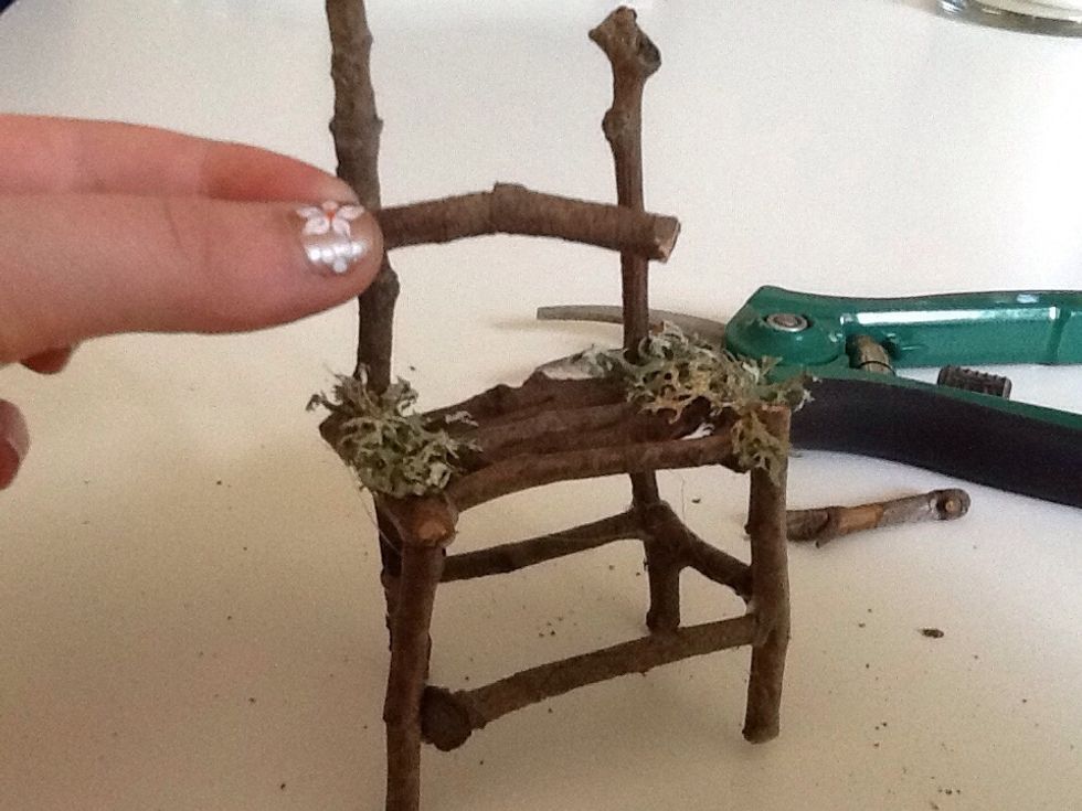 Cut two 2 inch long twigs for the back of your chair ( lengthen or shorten this measurement to fit your chair).