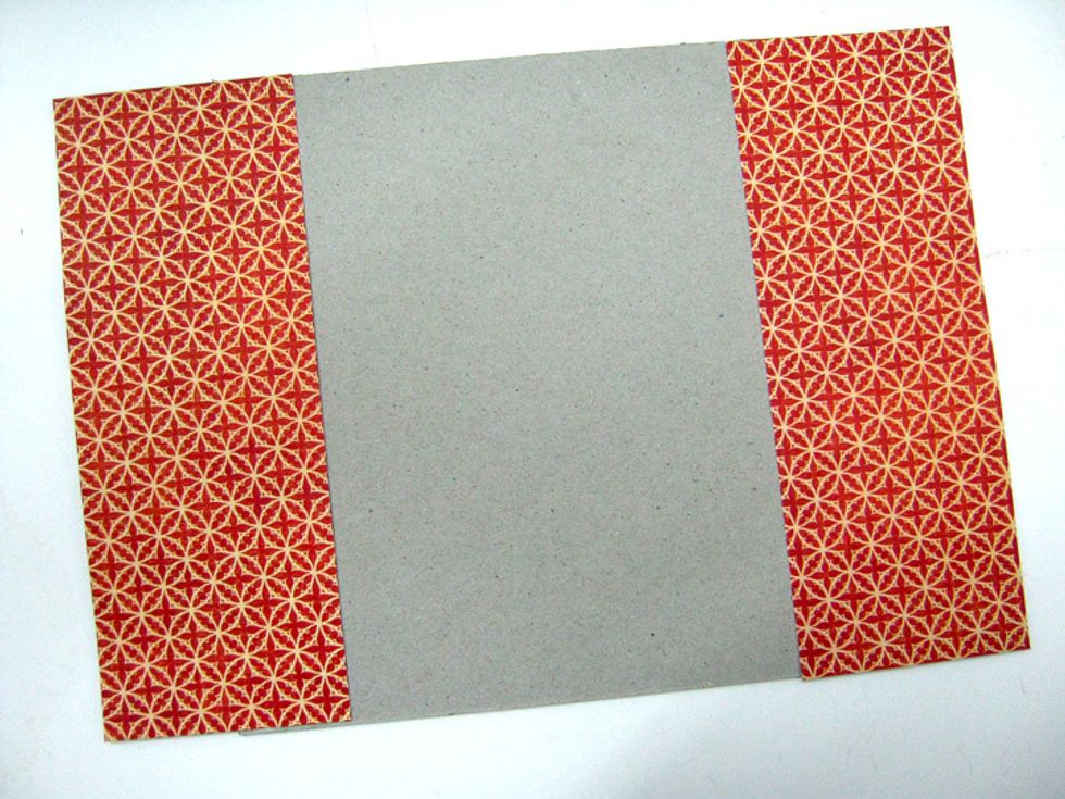 Cut two 3"x8" pieces from Sumptuous Floral paper (B-side). Adhere to 8"x8" chipboard covering 1" on each side.