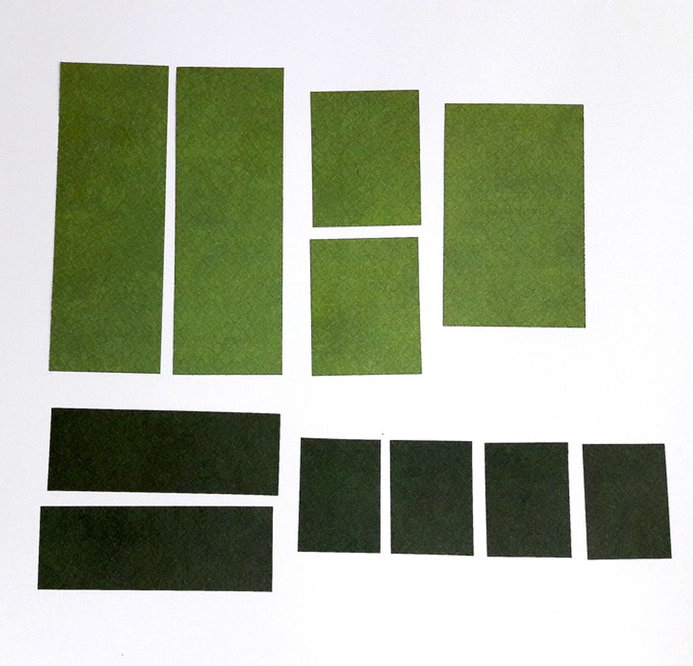 Cut two 5 3/8" x 1 7/8" squares, two 1 7/8" x 2 1/4" squares, one 3 3/4" x 2 1/4" square, two 3 3/4" x 1 1/4" squares, four 1 7/8" x 1 1/4" squares. Use double sided cardstock and alternate sides.