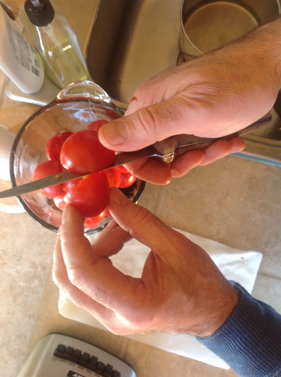 Cut two cups tomatoes.