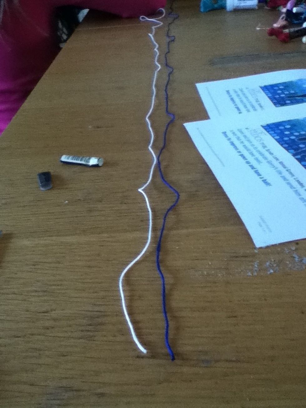 Cut two pieces double the length of hair