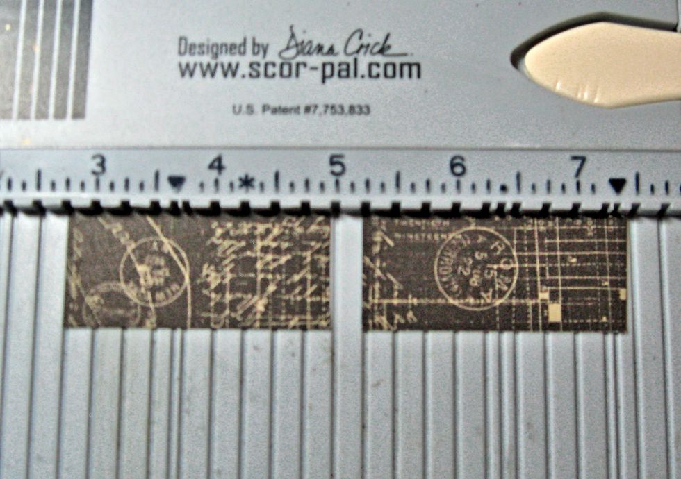 Cut two pieces of black paterned paper from the 6x6 pad. They should measure 1" wide by 2.25" long.