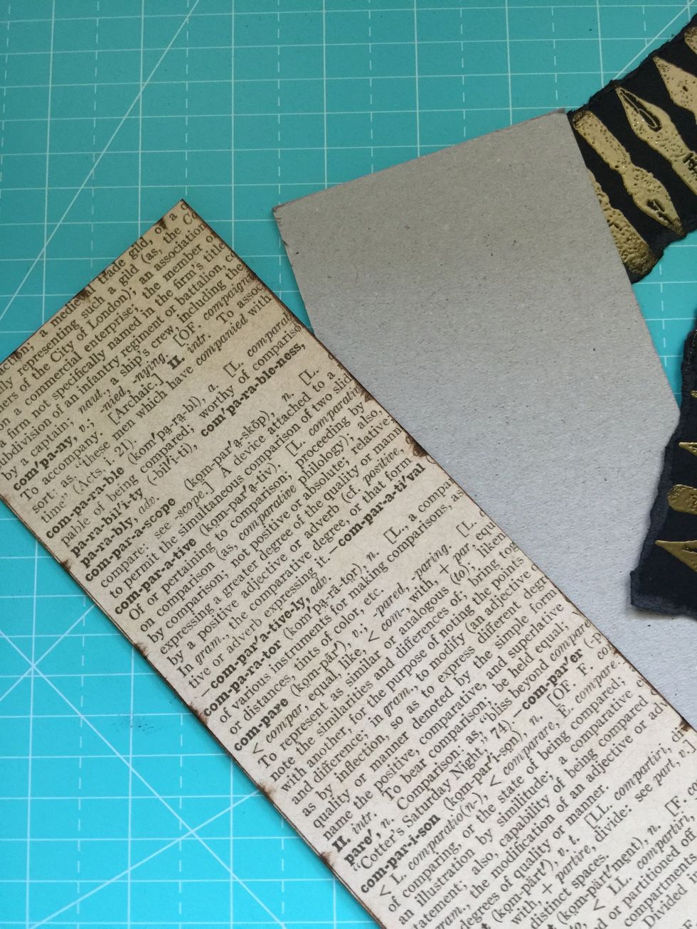 Cut two pieces of cardboard a little smaller than the rectangular paper.