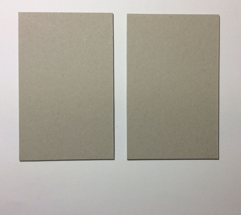 Cut two pieces of chip board at 3 1/2 x 5 1/2 inches and line with tape on side. These will form the covers of a score pad.