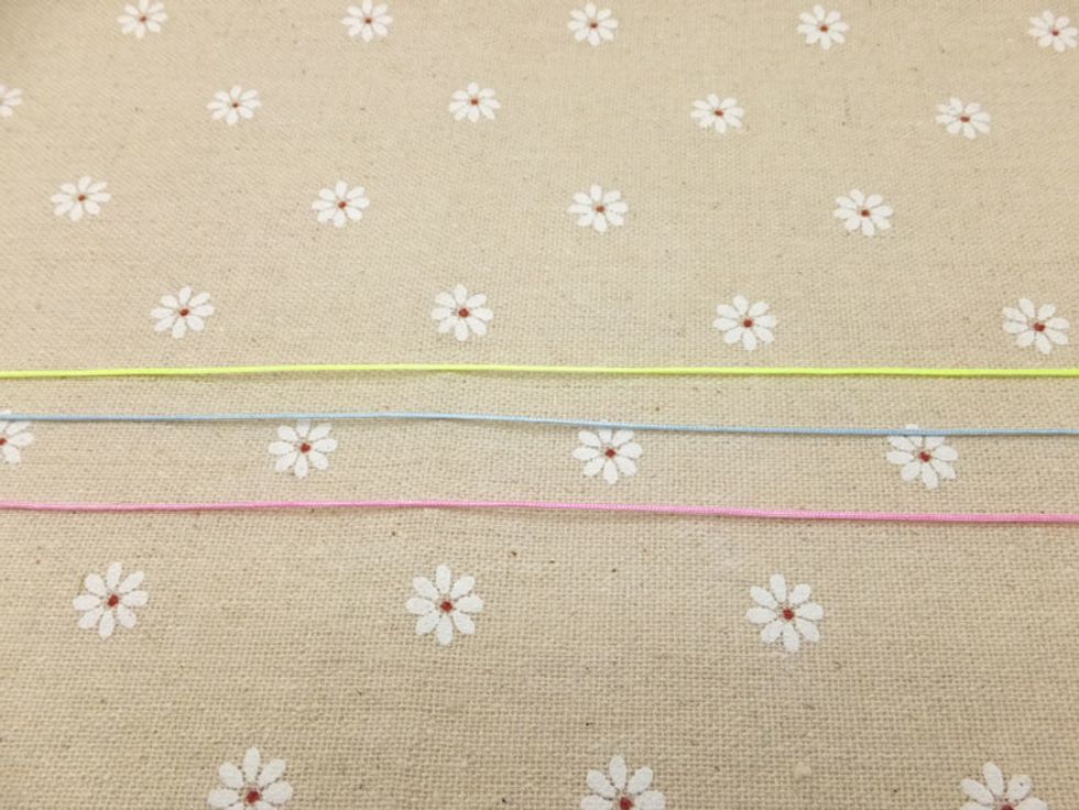 Cut two pieces of cords that are at least 32 inches (0.8meters) long. Now you have six cords and each cords are 32 inches (0.8meters) long.