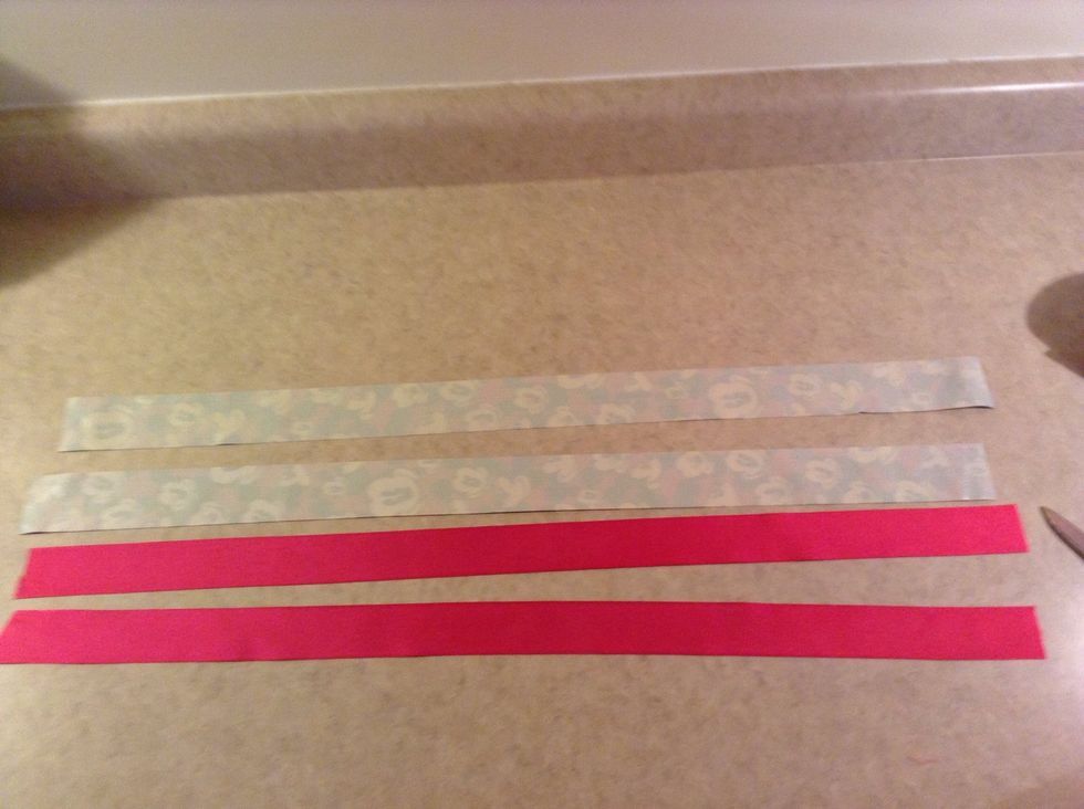 Cut two pieces of duck tape close to the size of the ribbon. (Will need to more pieces for the back)