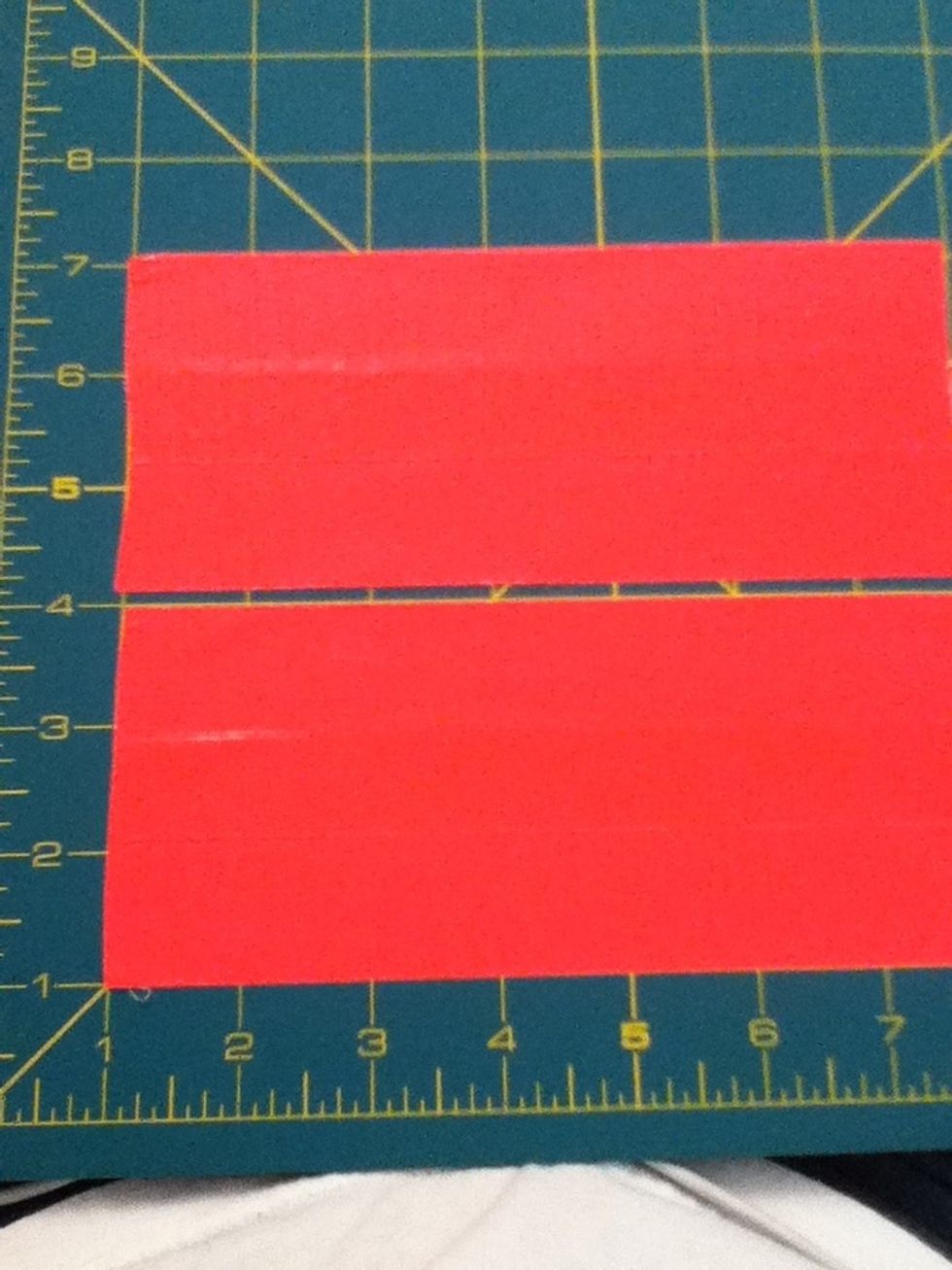 Cut two pieces of pink ductape 3inch by 7inch.