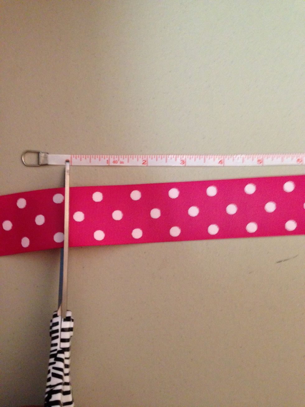 Cut two pieces of ribbon make sure they are the same length.