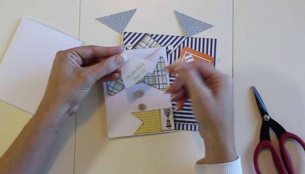 Cut two small triangles. ( I used KLD Tiny Shapes 1T)