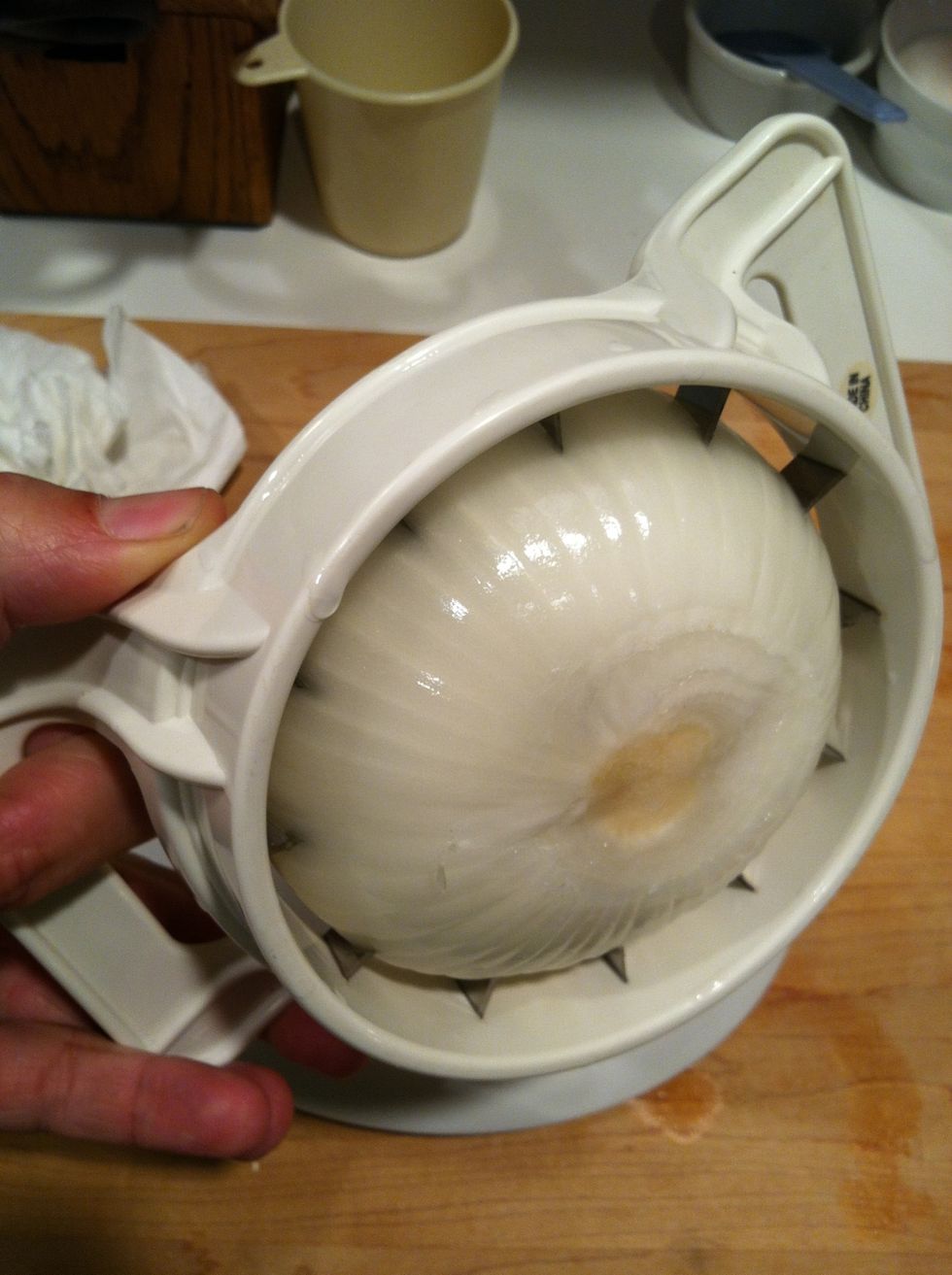 Cut until you get within half an inch or so of the bottom.