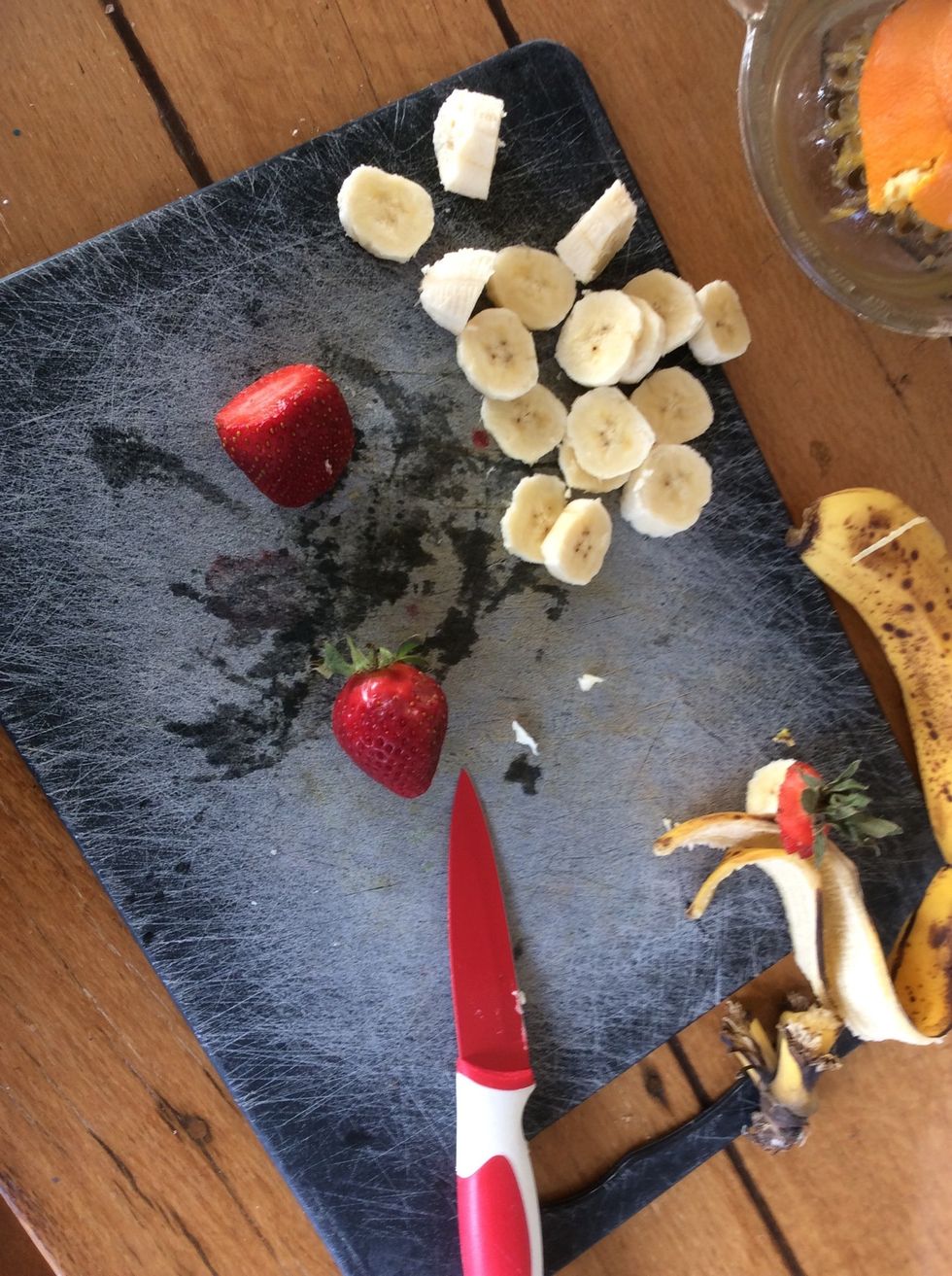 Cut up 4 strawberries \ud83c\udf53
