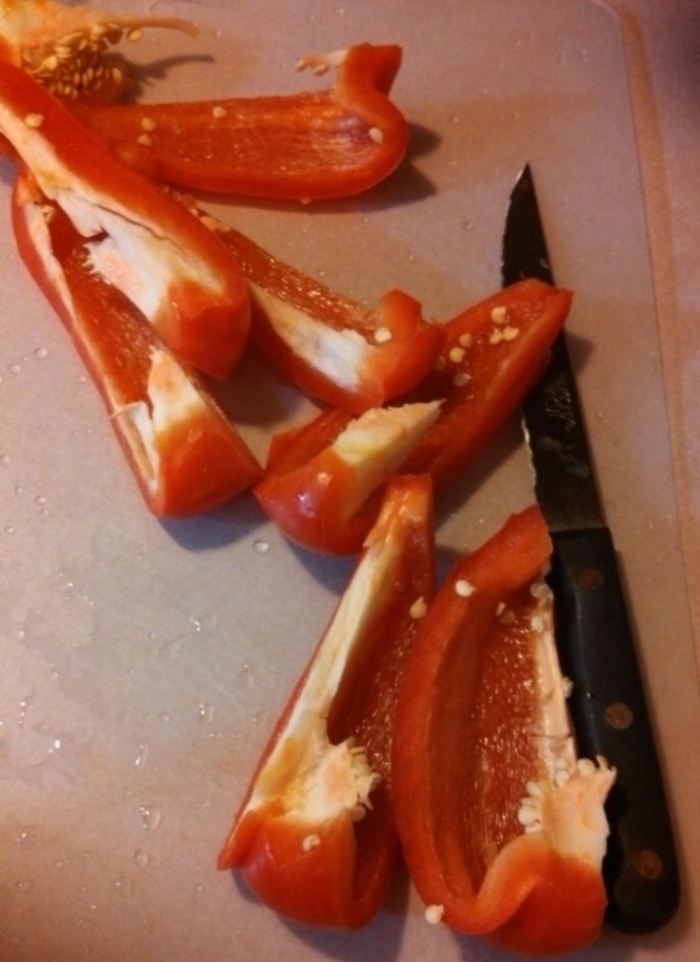cut up a red pepper into slim pieces and add to pan.