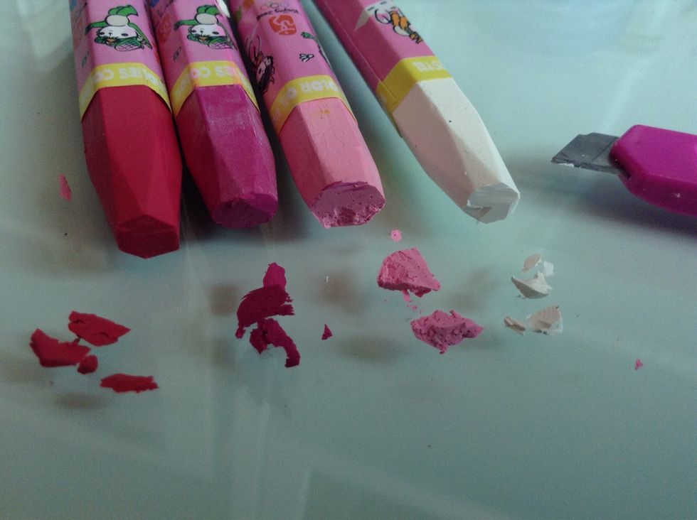 Cut up a tiny amount of crayon. I used several different shades of pink and a bit of white. Use a pen knife for this step.