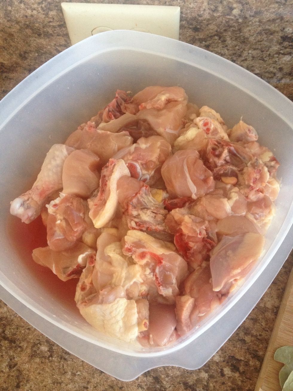 Cut up a whole chicken. Remove skin where you can.