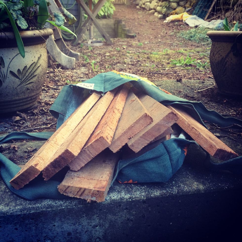 Cut up a wood pallet. These can be rough cuts at different lengths.
