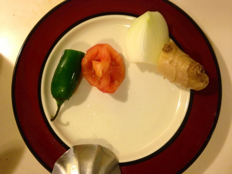 Cut up all of the ingredients into small pieces. Grate the ginger. Substitute option: add a tea spoon of red hot pepper it you don't have any jalape\u00f1os.