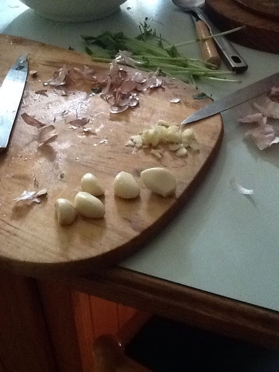 Cut up and skin garlic
