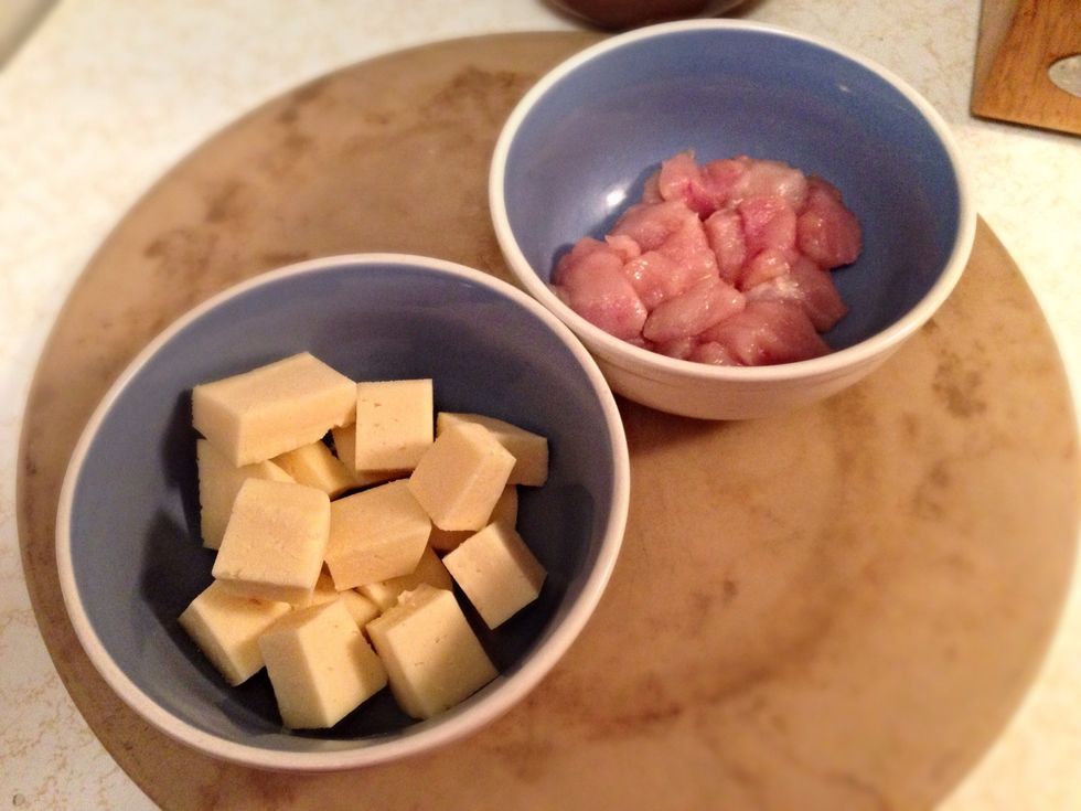 Cut up chicken into little "cubes", same with the cheese. Only use cheese that actually contains milk ingredients! (Like Gouda, Eidam...) No radioactive north american cheddar! Seriously.