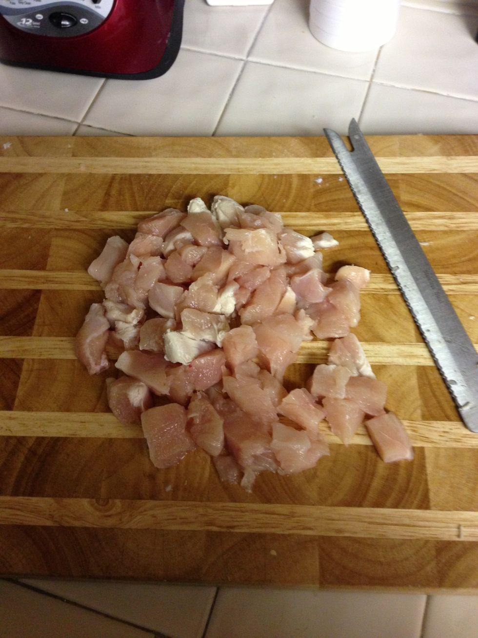 Cut up chicken into pieces.