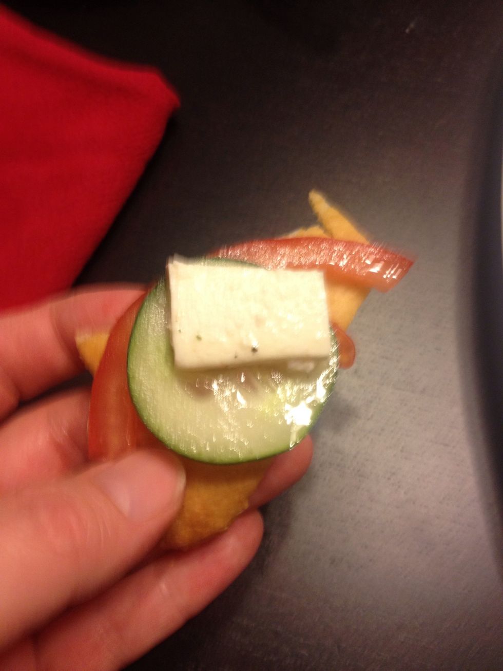 Cut up crescent rolls into half's, add cucumber, tomato, mozzarella and eat