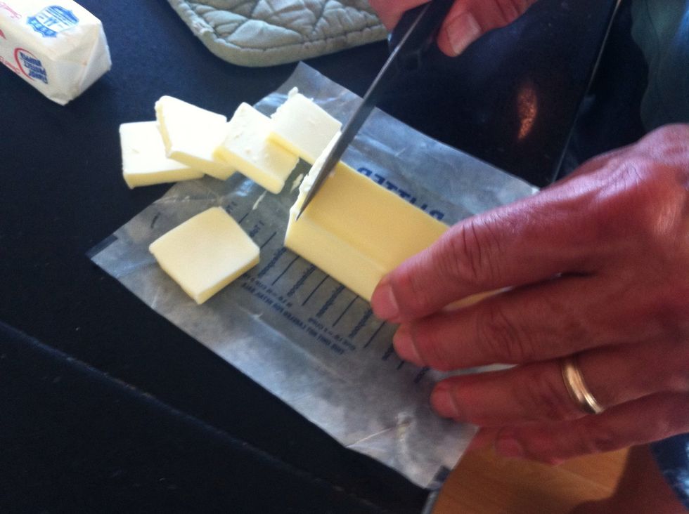Cut up four sticks of butter