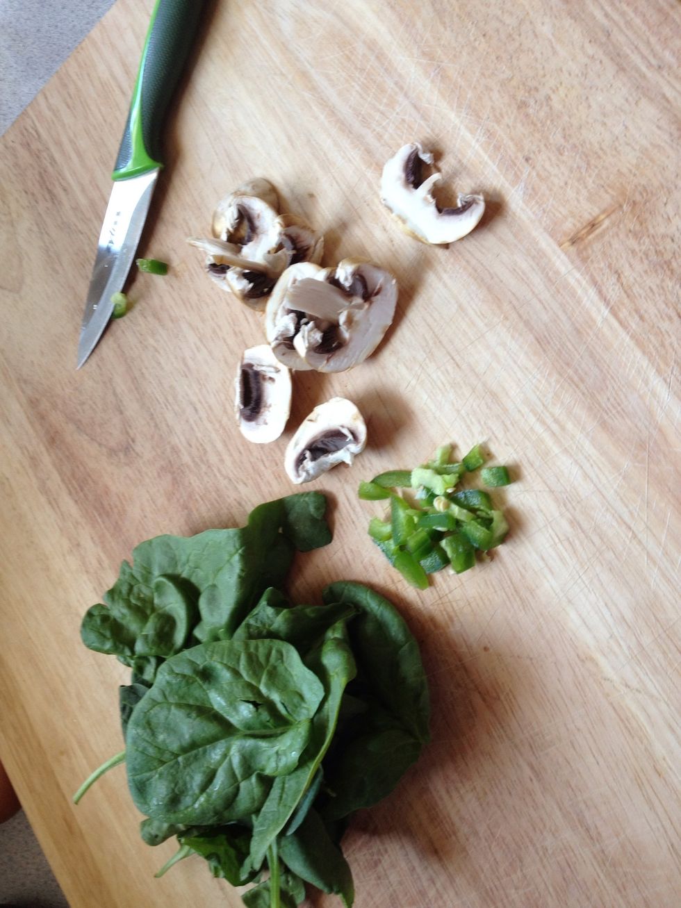 Cut up meats or veggies you want with your eggs. I had mushrooms, spinach and jalape\u00f1o  on hand today.