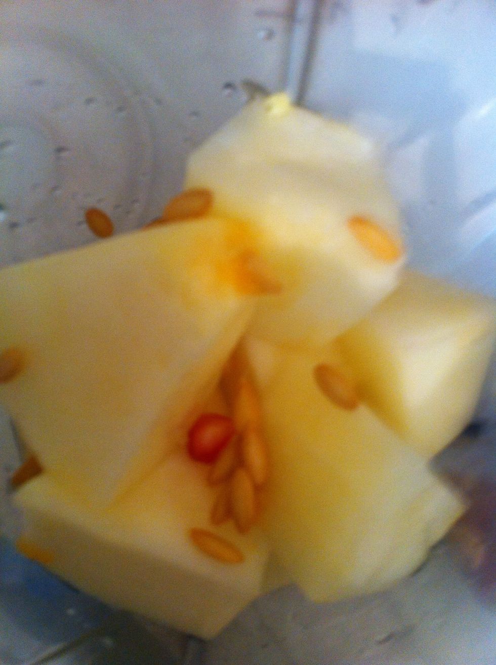 Cut up melon chunks in blender. You might as well throw in the seeds as they are full of goodness if you're really health conscious. This is gonna make the base of this juice