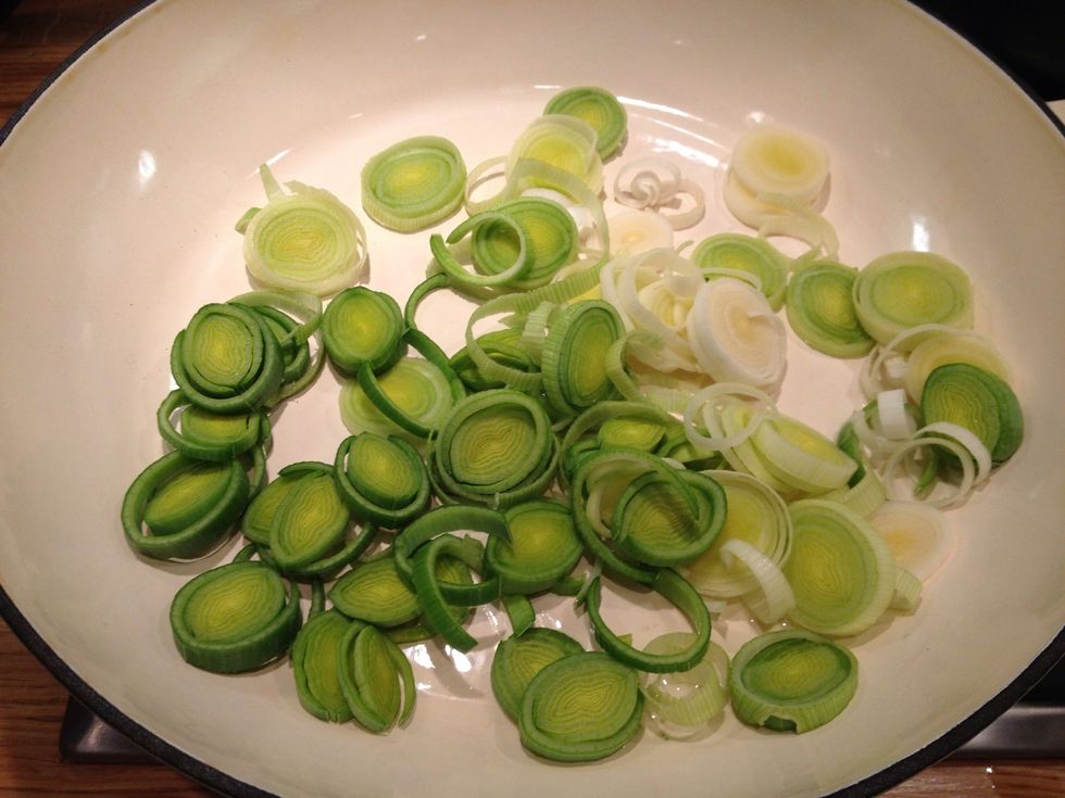 Cut up one leek and saut\u00e9 in a little oil on a low to medium heat until softening