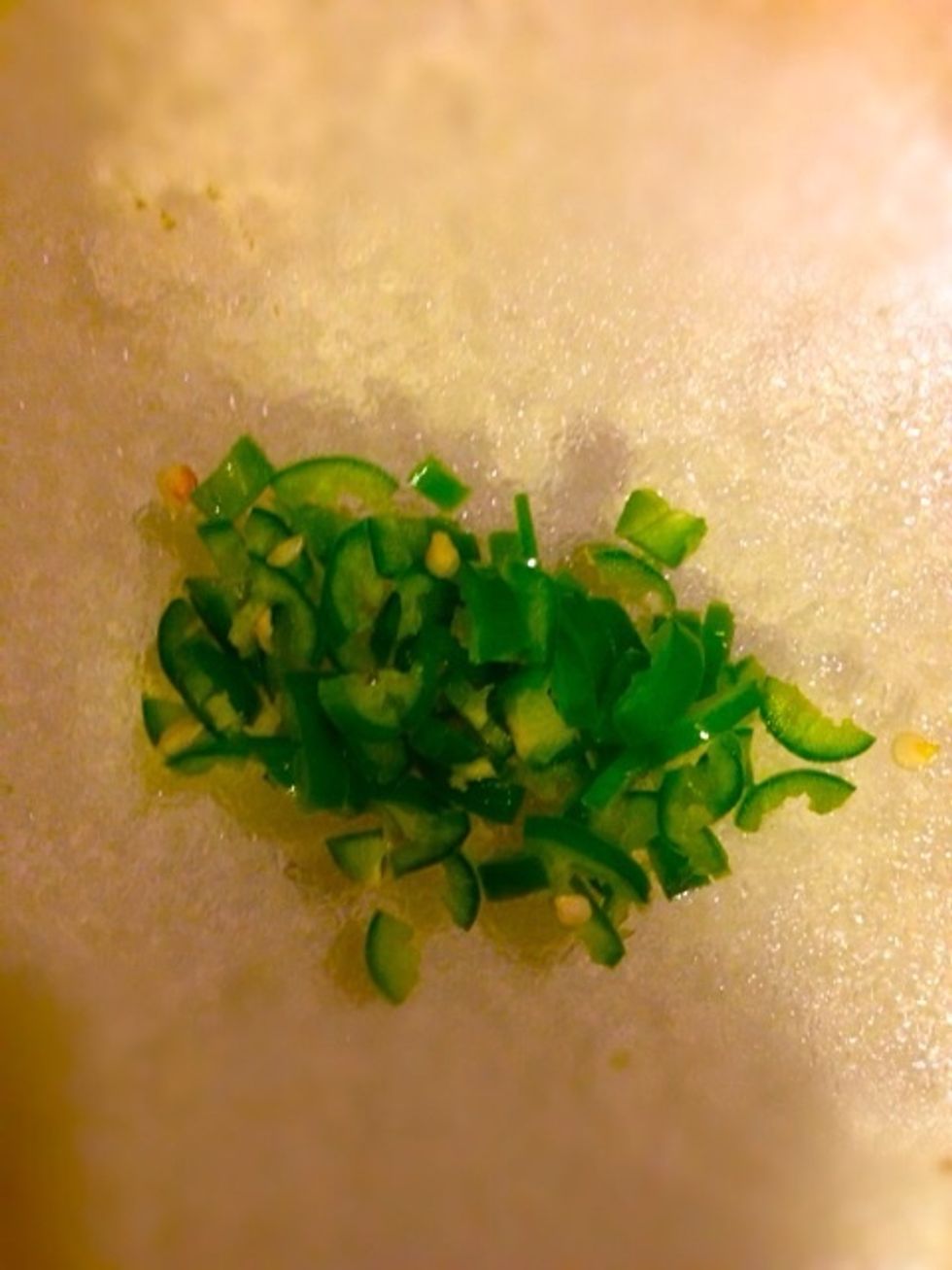 Cut up one small Serrano pepper