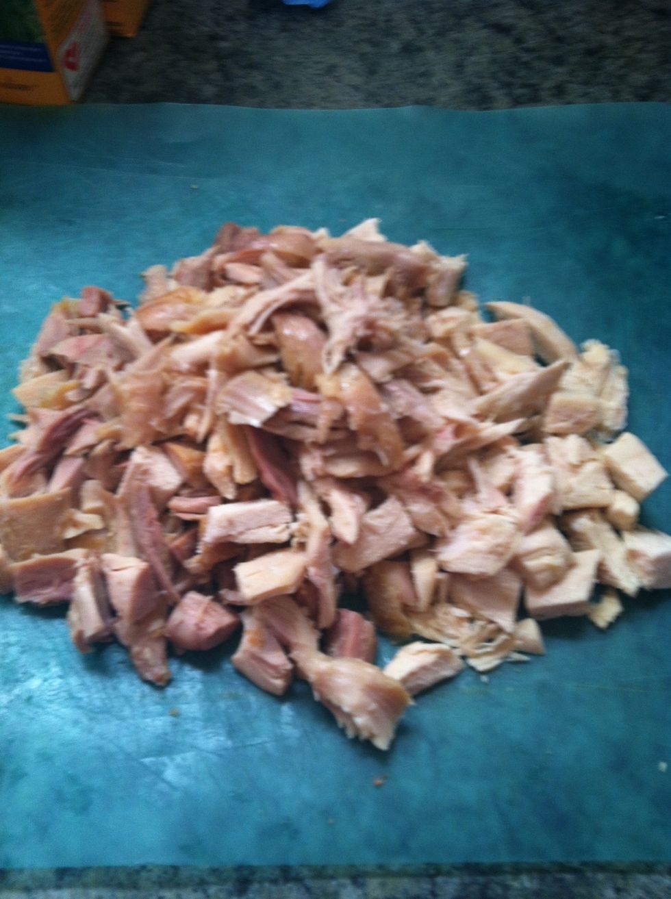 Cut up or rip up the rotisserie chicken, using both white and dark meat. I use the rotisserie chicken from the store b/c it's easy and less work. That means I get to eat sooner!!