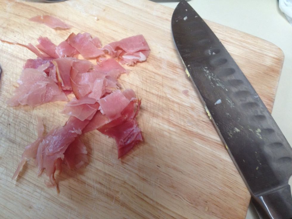 Cut up prosciutto into medium size pieces
