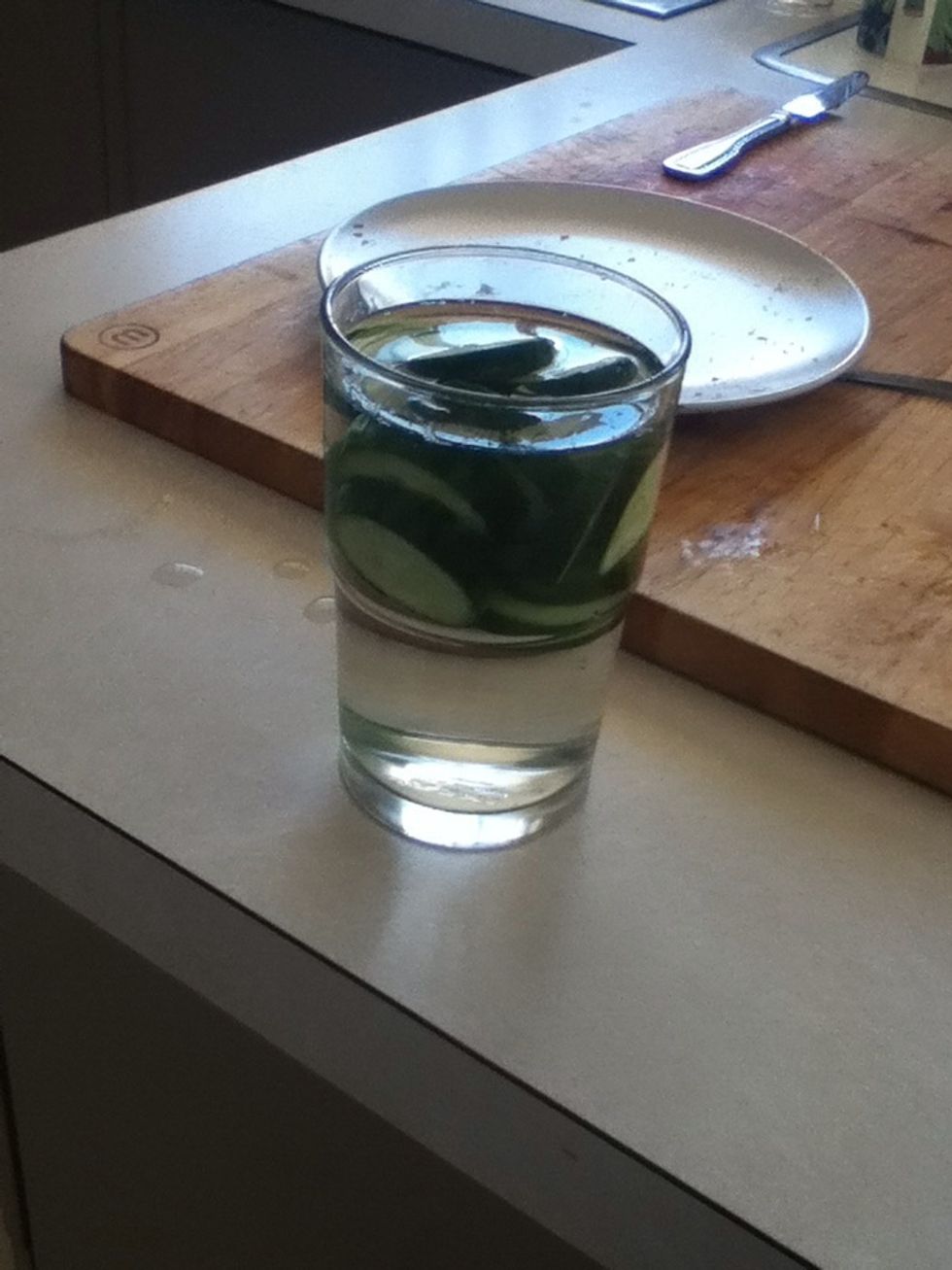 Cut up some cucumber and put it in a glass of cold water