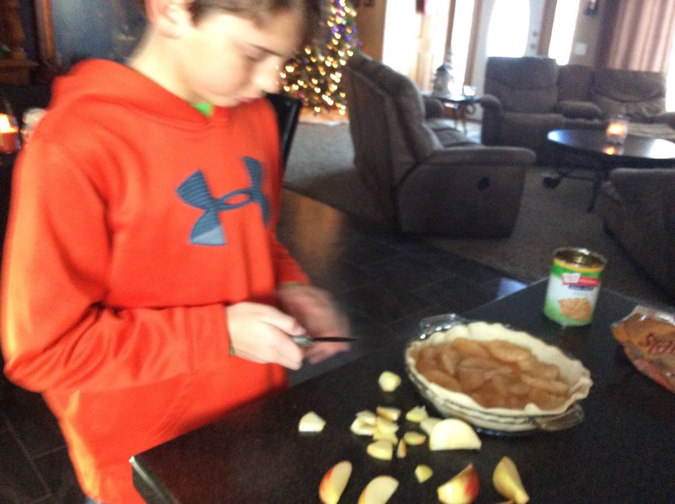 Cut up the apple for putting on top.