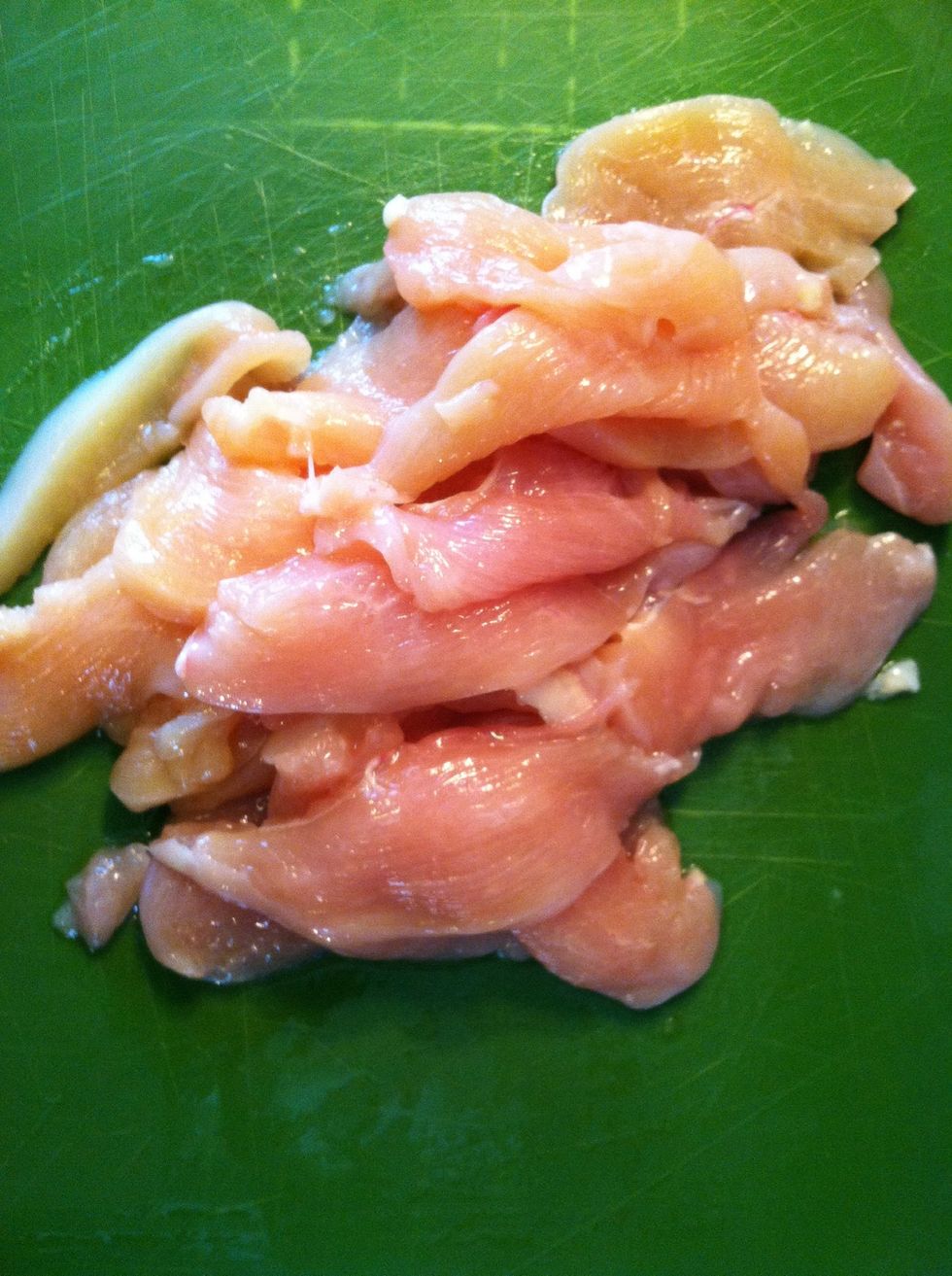 Cut up the boneless chicken breast into long strips.