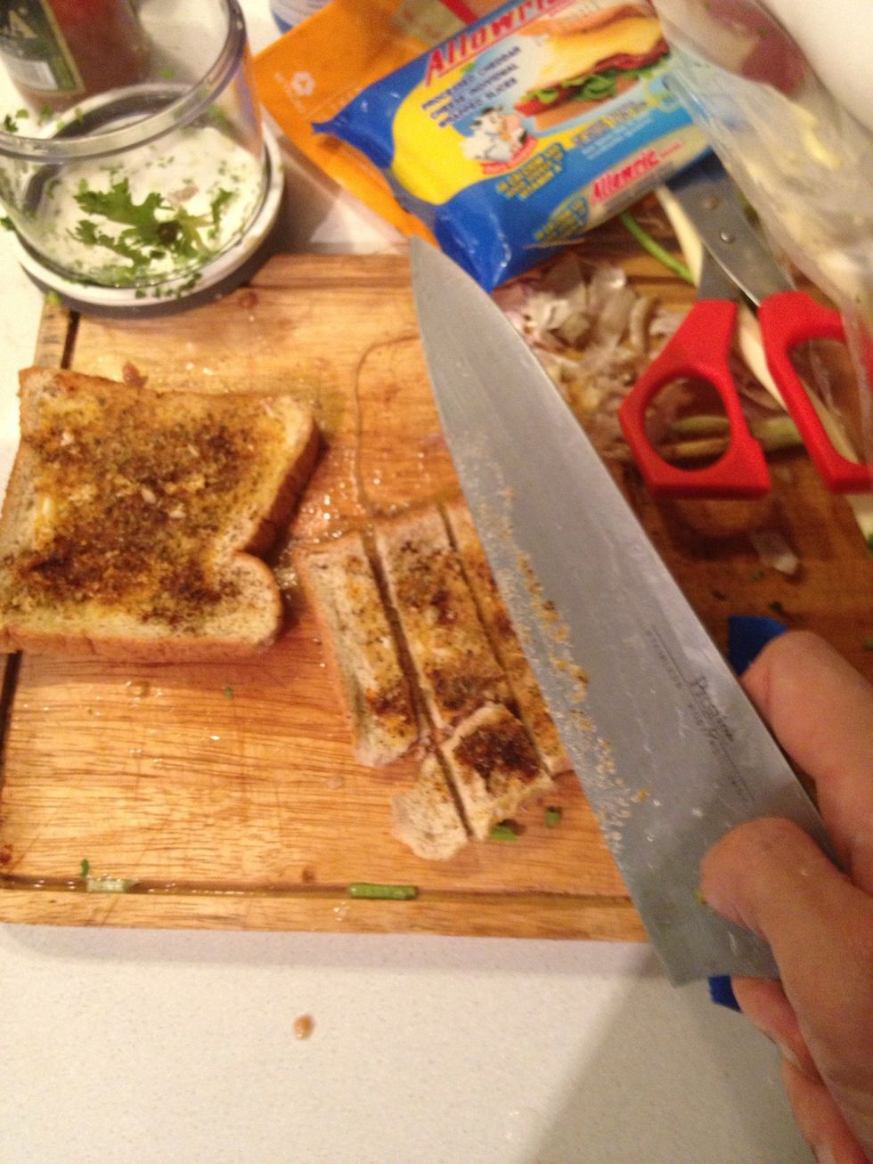 Cut up the bread in to croutons. ( u can use this in salads too!) it's quick and u can taylor made ur own flavour.