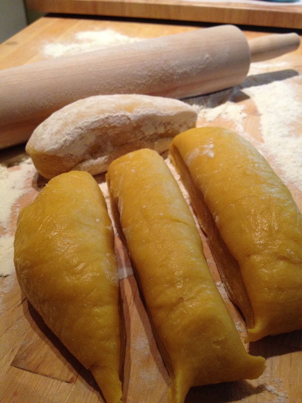 Cut up the dough into decent sized pieces. Flour the dough.