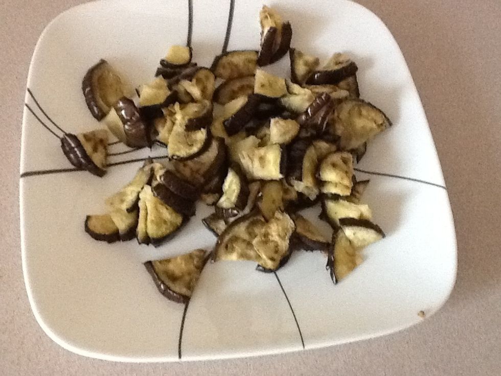 Cut up the eggplant into 4 or 6 depending on size. I use my handy dandy kitchen scissors.