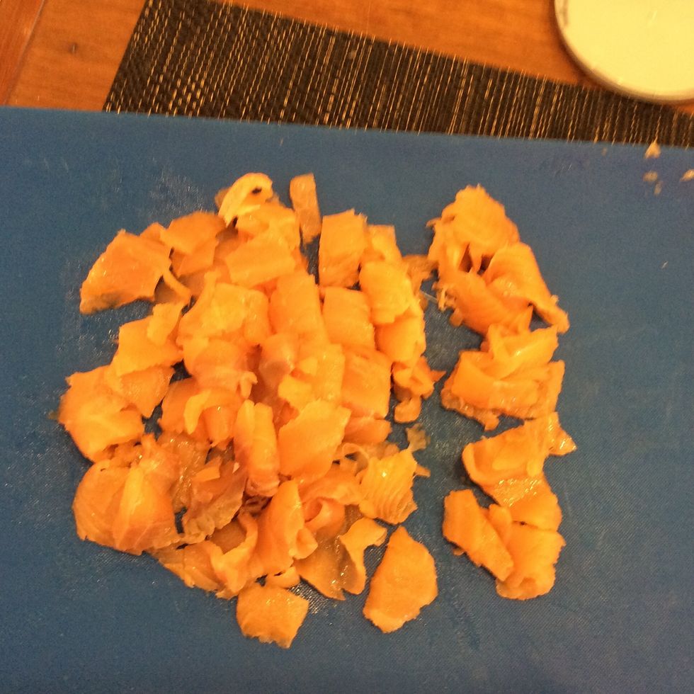 Cut up the salmon and put it into the bowl.