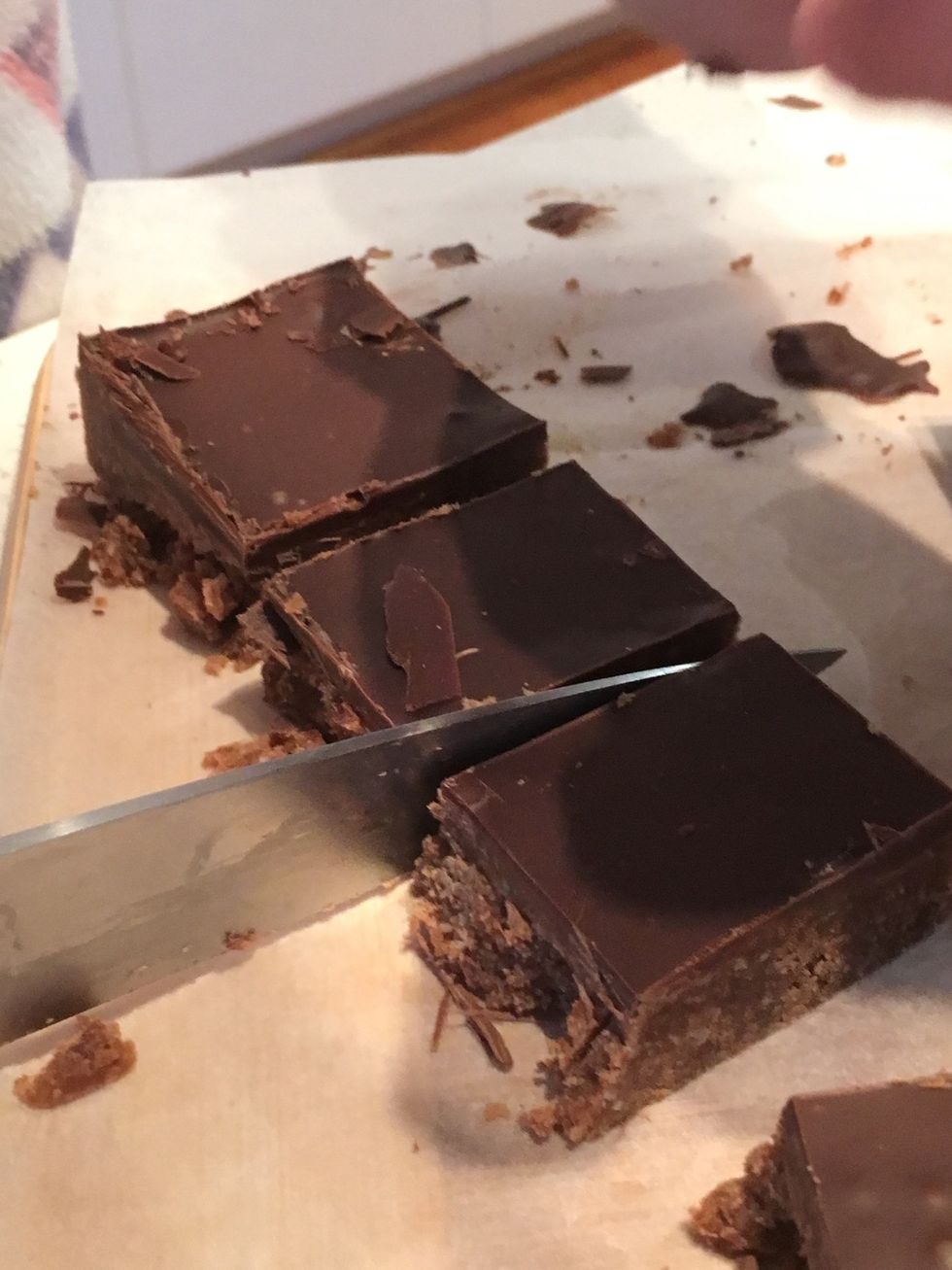 Cut up the slice into little squares. Make sure to have adult supervision while doing this.