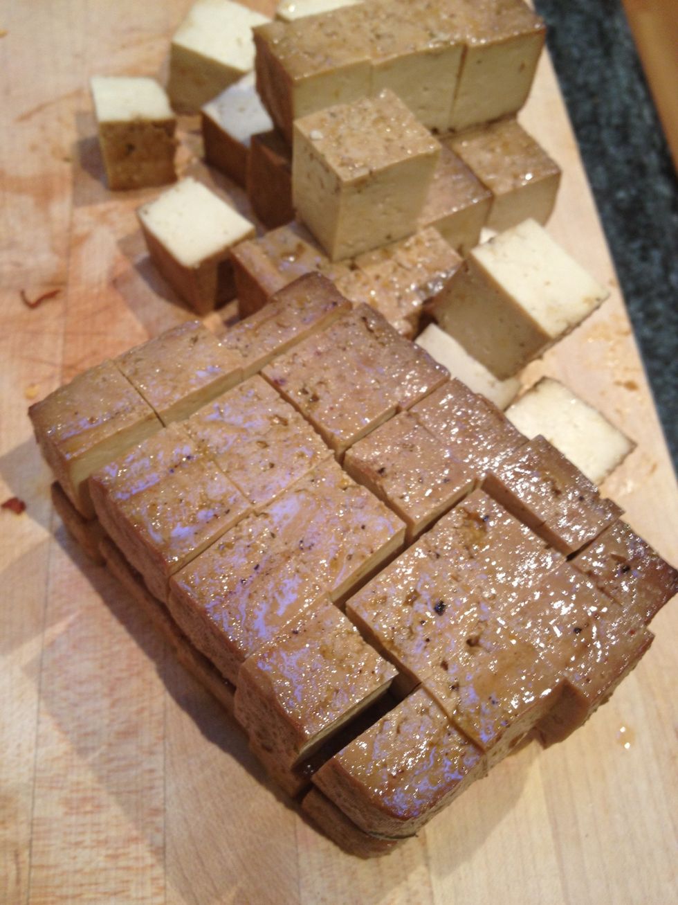 Cut up the tofu into cubes. You can used any sort of baked or pan fried tofu you like. I cheated and used store bought marinated tofu (Wildwood Organic Royal Thai Sprouted Baked Tofu).