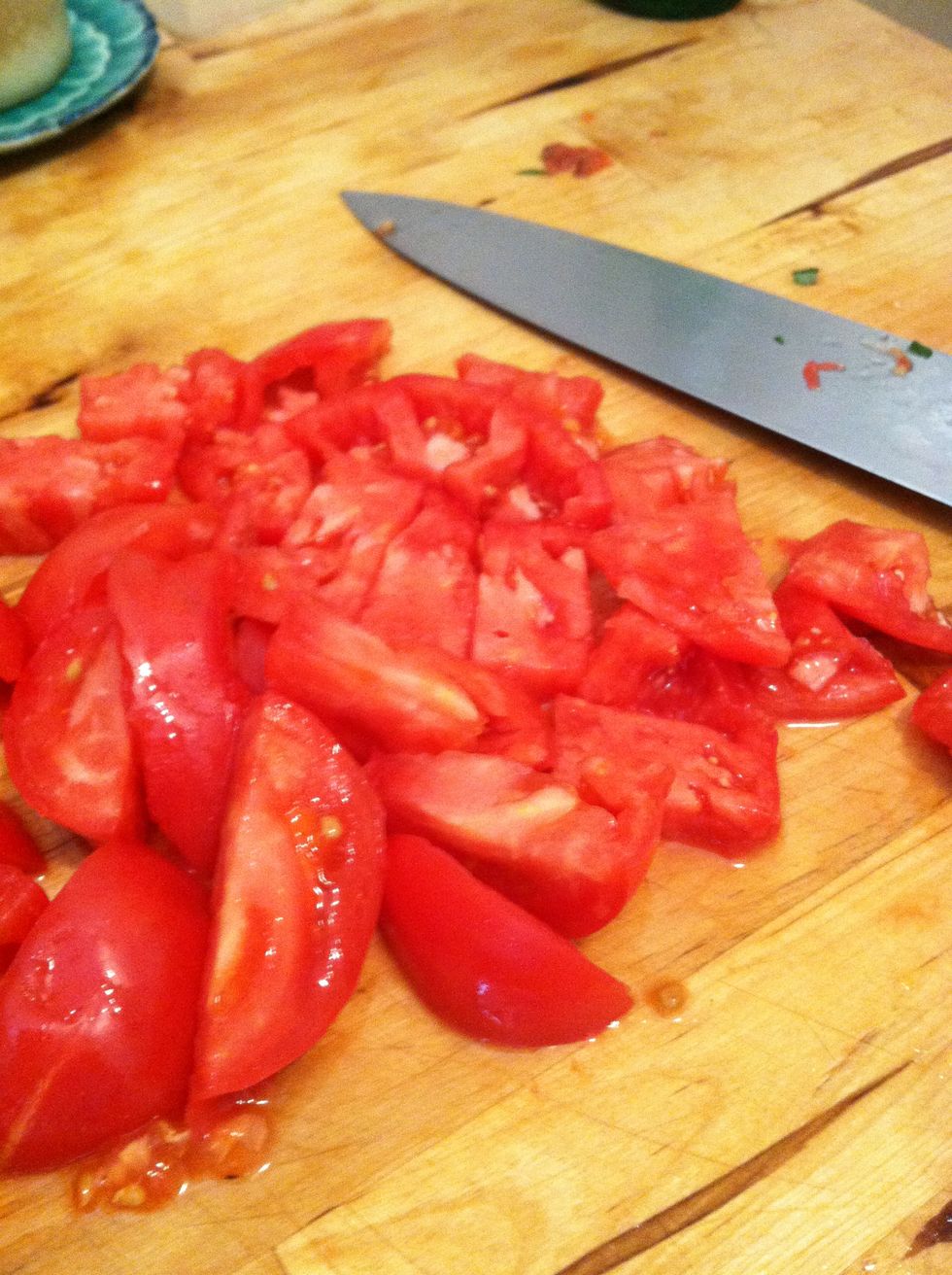 Cut up the tomatoes and toss these into the bowl as well.