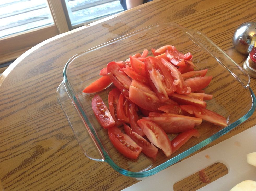 Cut up three tomatoes